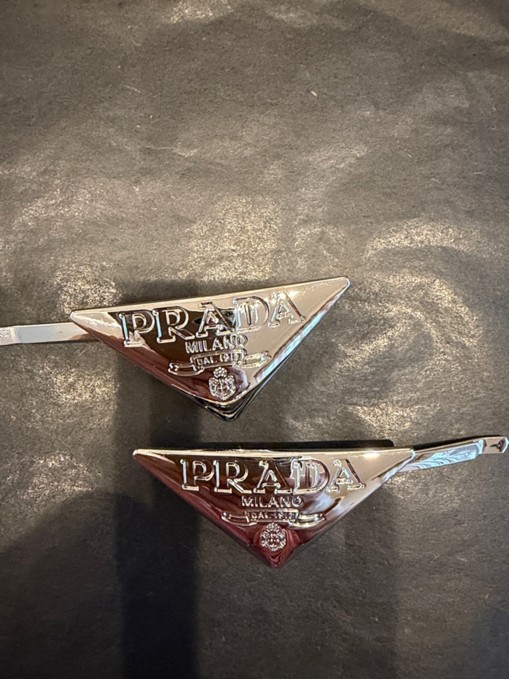 Prada Silver Tone Triangle Logo Hair Clips